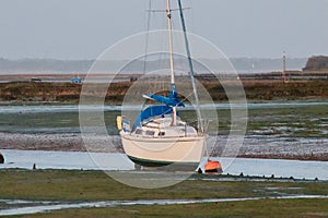 Sailing boat waiting for high tide