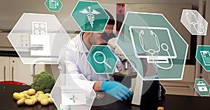 Image of scientific icons in hexagons over caucasian male lab worker using microscope