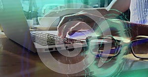 Image of scope scanning and data processing over person using laptop