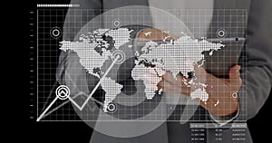 Image of screens with data processing over businessmen using tablet