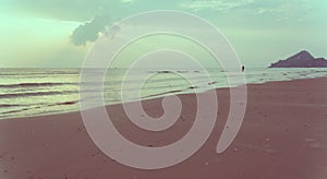 image of sea and cloudy sky over it.