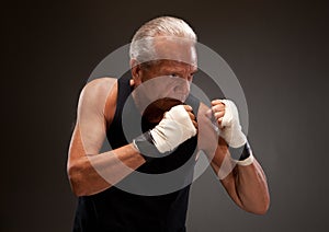 Image of a senior man in a fighting stance