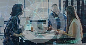 Image of server room and padlock over diverse business people discussing work in office