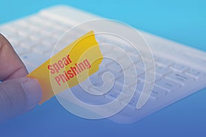The image serves as a warning, urging individuals and organizations to be vigilant about recognizing and avoiding spear phishing photo