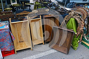 Image of several antique wooden troughs. photo