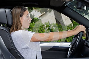 image shocked young woman driving car