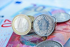 Euro and Swiss Francs banknotes and coins
