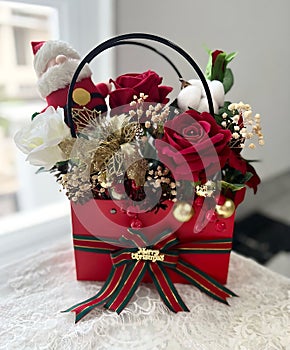 Christmas Flower Basket that Says & x22;MERRY CHRISTMAS& x22;