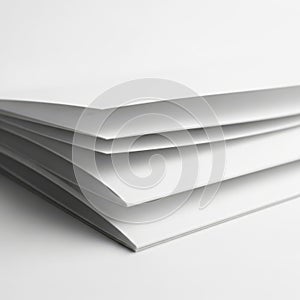 A close-up view of a stack of blank white paper sheets on a surface