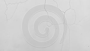 cracked white wall texture with visible damage