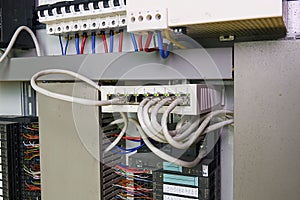 Image shows control cubicle. Multimode fiber switch and circuit breakers inside power case