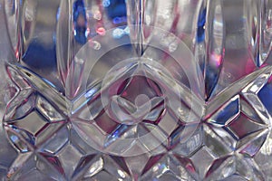 Macro abstract background of beautiful modern hand-cut lead crystal glass texture with diamond shape cuts
