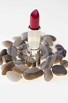 Red lipstick on white background photo