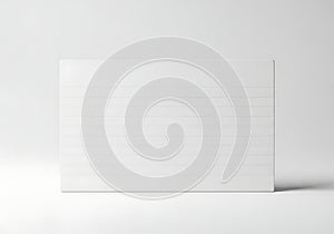 Minimalist white rectangular object against plain background