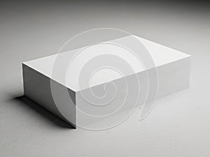 A plain white rectangular box against a gray background