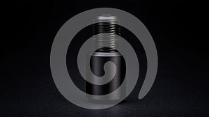 A black cylindrical object with a threaded end.