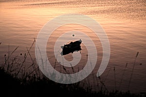 image that shows the solitude represented by a boat