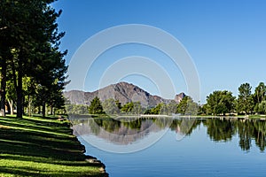 The mountain is reflected at the end of the lake