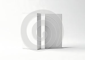 A white rectangular object next to a gray rectangular object