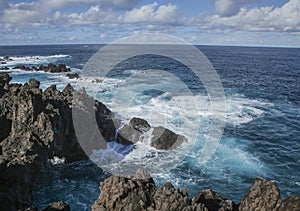 Porto Moniz, Madeira, Portugal - foamy waters of the ocean and rocks.