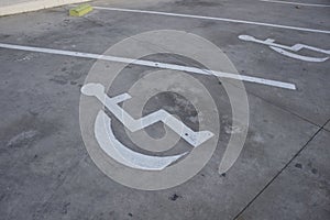 Image of the sign painted on the floor of a parking space for disabled drivers