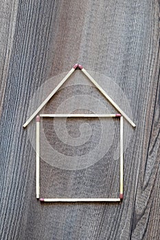 simple house of match sticks