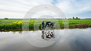 Image of skaters in the Dutch landscape photo