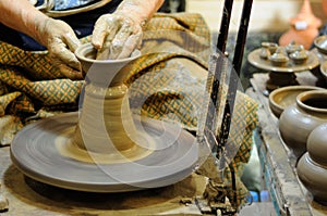 A Skilled Potter Making Clay Pots