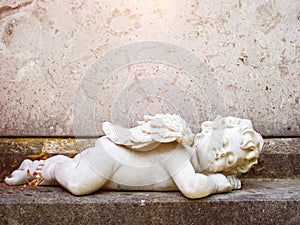 sleeping angel grave statue