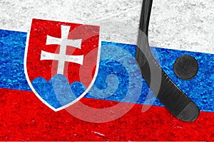 Image of the Slovak flag, hockey stick and puck