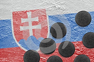 Image of the Slovak flag on the ice and washers