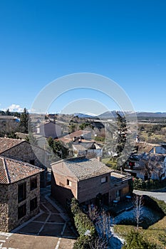 Image of the small Madrid town of Buitrago de Lozoya with its houses. photo