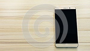 Image smart phone on white wood table