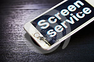 Image of smartphone with broken screen and the word Screen Service on it