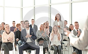 image of a speaker giving a lecture at a business seminar