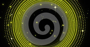 Image of spinning yellow glowing circles on black background