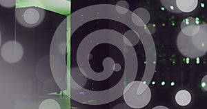 Image of spots of light and data processing over computer servers