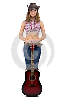 Image of standing cowgirl with the guitar