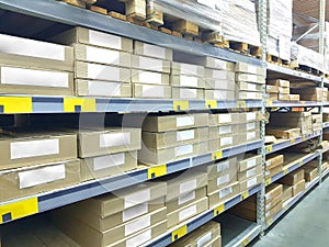 Image of stock inventory shelf, stack of carton boxes, modern logistics smart warehouse management. For wholesale