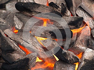 Image of stones with soot tongues of fire