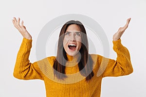 Image of stressed brunette adult woman screaming and throwning up hands