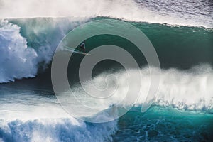 Image Surfer on Blue Ocean Big Mavericks Wave in California