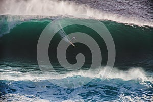 Image Surfer on Blue Ocean Big Mavericks Wave in California photo