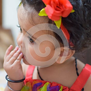 Image of sweet baby girl in a wreath, closeup portrait of cute 12 months old smiling girl, toddler, Adorable little baby girl, smi