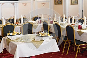 an image of tables setting at a luxury wedding hall
