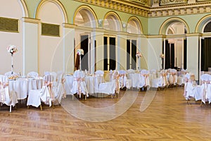 An image of tables setting at a luxury wedding hall