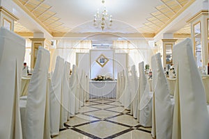 An image of tables setting at a luxury wedding hall