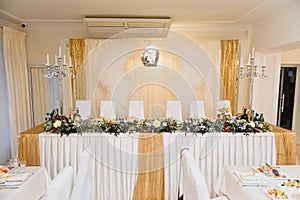 An image of tables setting at a luxury wedding hall