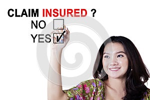 Teenage girl approving claim insured