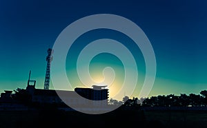 image of Tele-radio tower with blue sky .